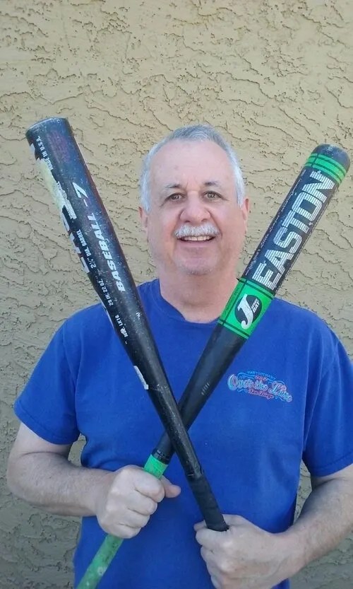 Steve+X+bats a person holding a baseball bat